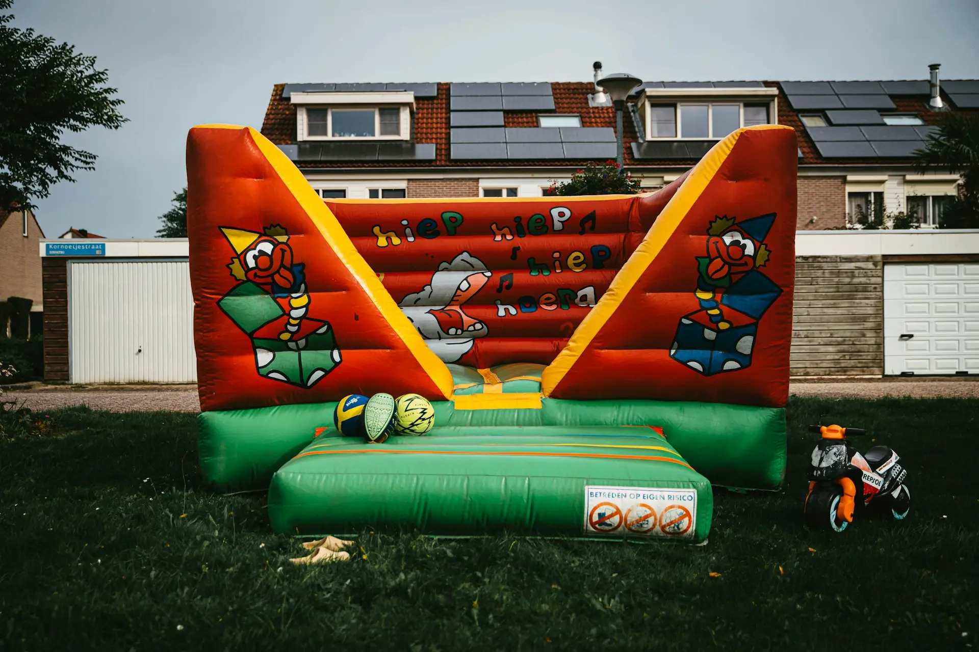 a large inflatable bouncer in a yard